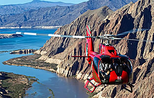 Tour helicopter flying to the Grand Canyon from Las Vegas over the Colorado River