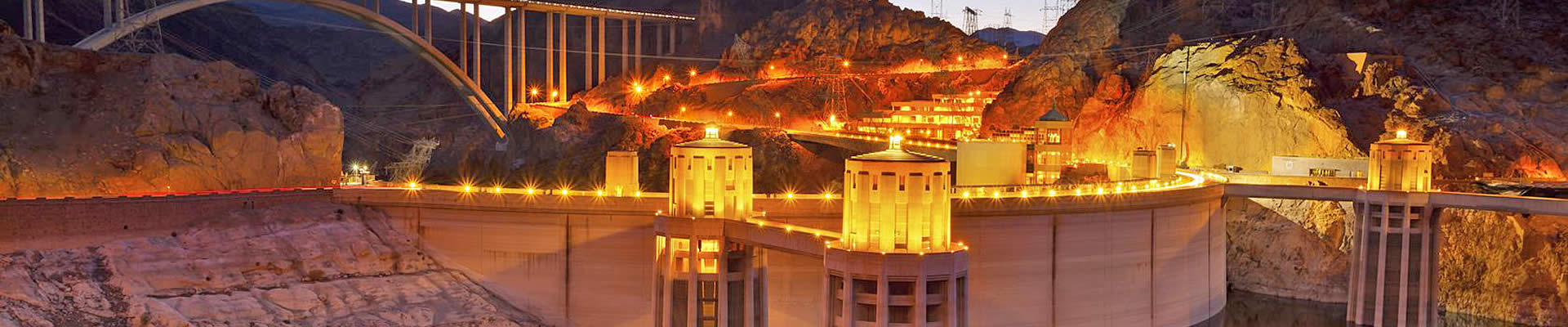 The Hoover Dam at night on your Hoover Dam bus tour